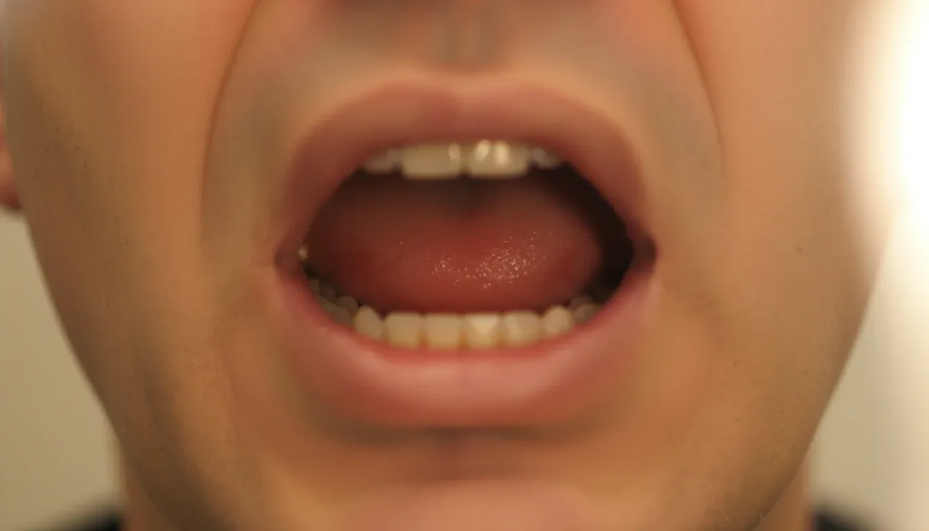 How to Get Rid Of a Sore Throat (4 Ways)